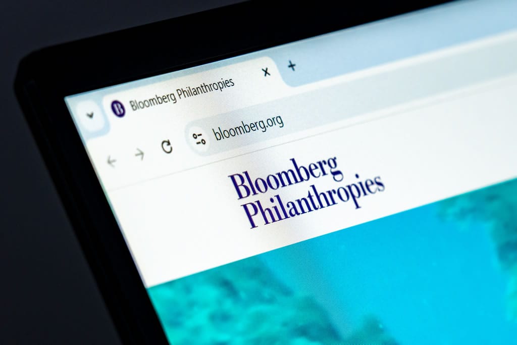 Bloomberg Philanthropies website homepage shown on screen.