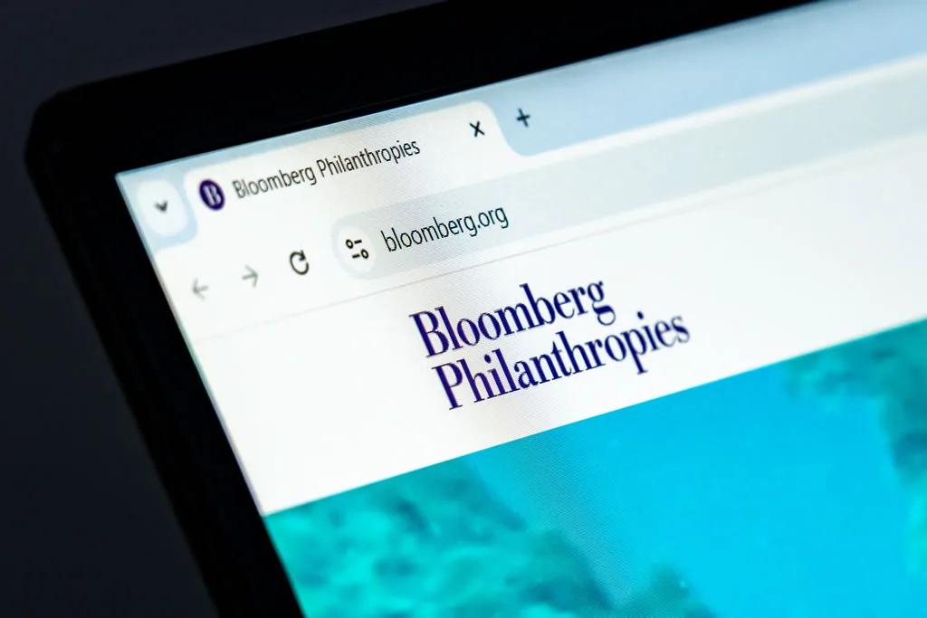 Bloomberg Philanthropies website homepage shown on screen.