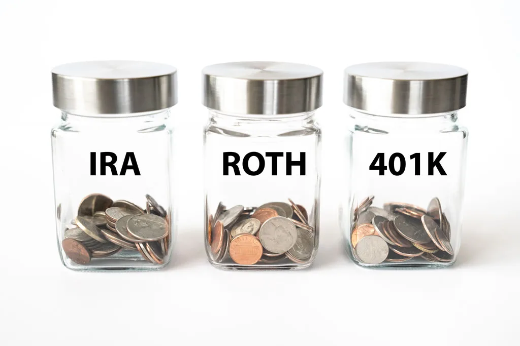 Jars labeled IRA, Roth, 401k with coins.
