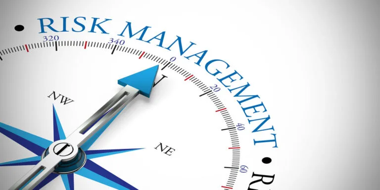 Compass illustrating risk management concept